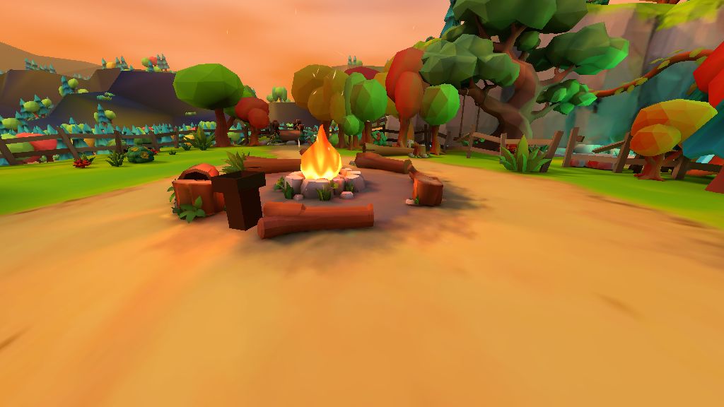 At the campfire, looking at the fire.